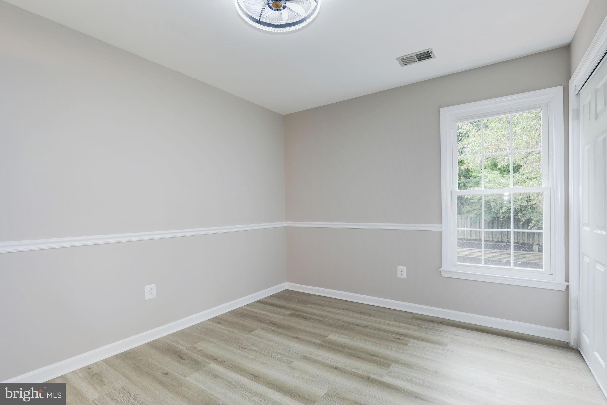 14422 Old Stage Road Bowie, MD 20720 - Photo 36 of 65 an empty room with a window