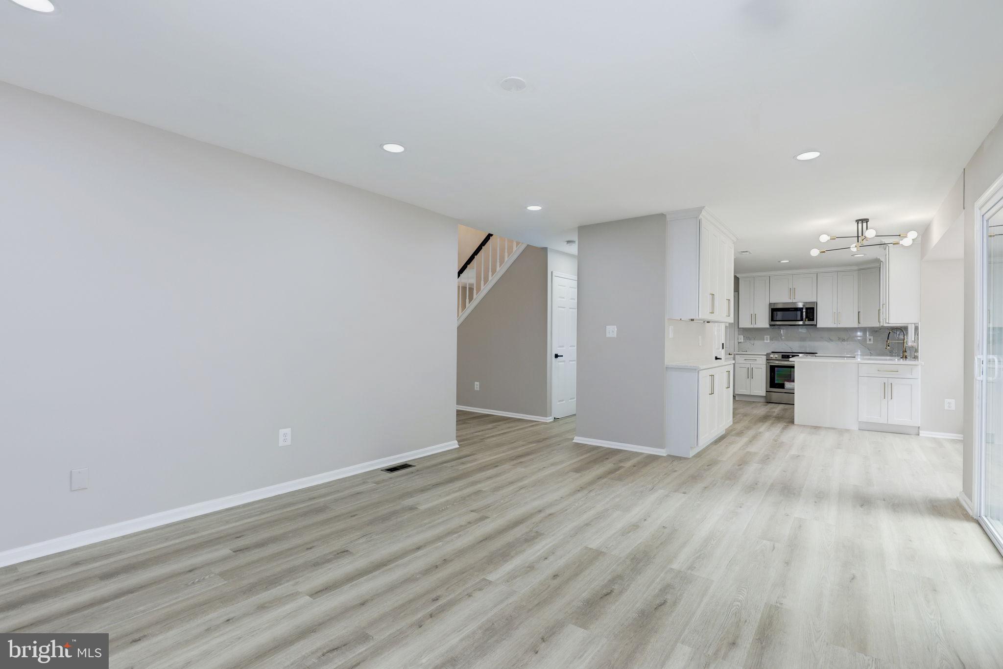 14422 Old Stage Road Bowie, MD 20720 - Photo 10 of 65 a view of kitchen with wooden floor