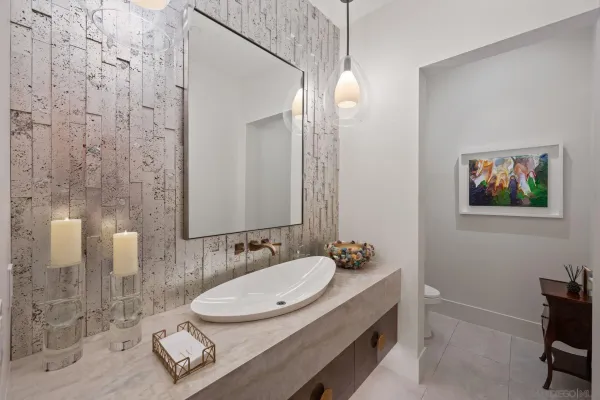 a bathroom with a sink double vanity and a mirror