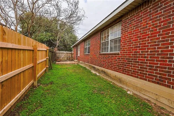 a view of a backyard with a garden