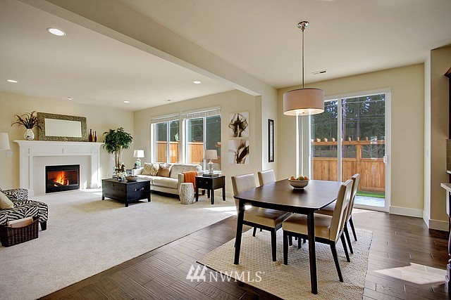3800 227th Place Southeast Bothell, WA 98021 - Photo 3 of 20 a outdoor space with furniture and fireplace