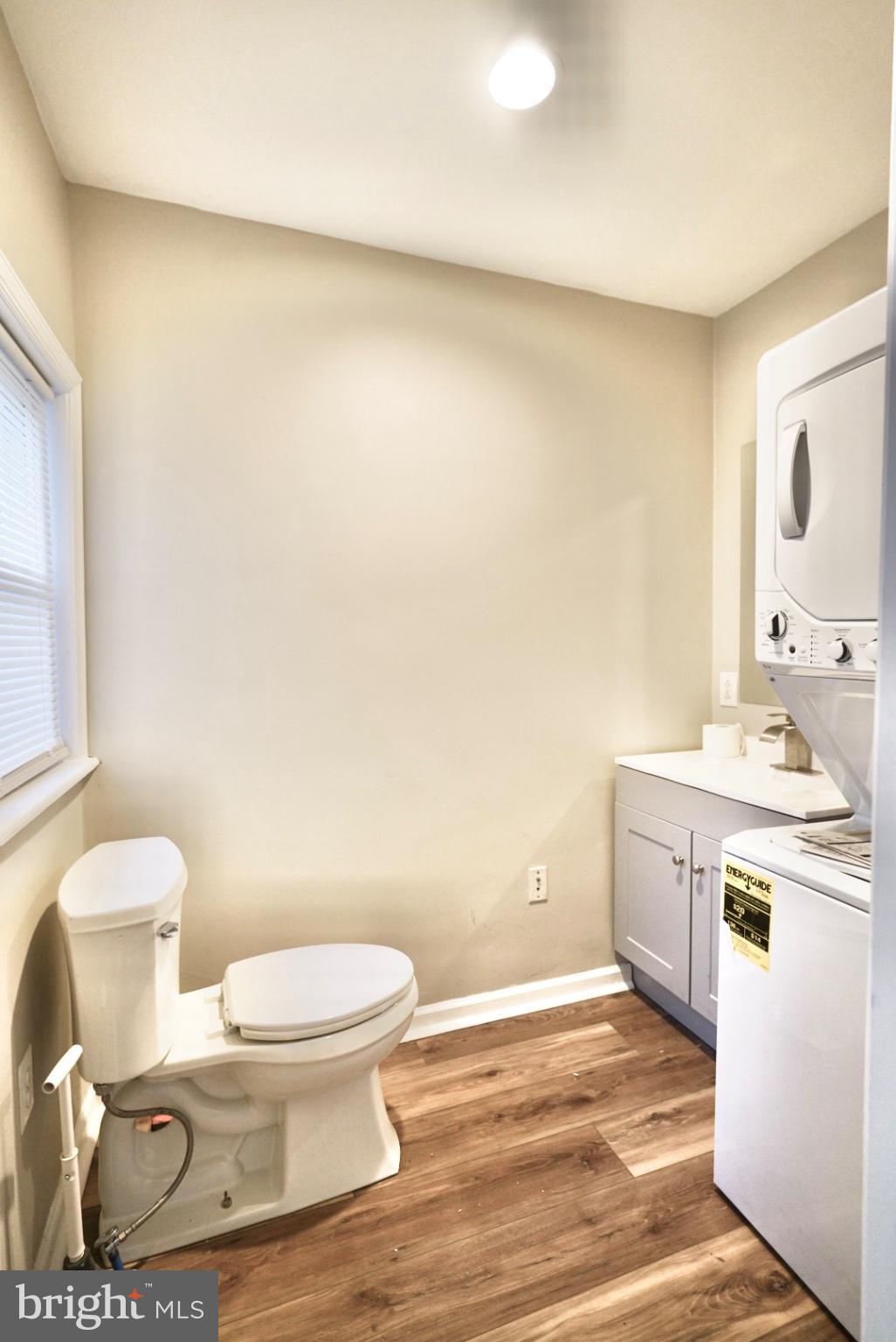 2655 Cedar Street Philadelphia, PA 19125 - Photo 12 of 22 a bathroom with a granite countertop toilet and a sink