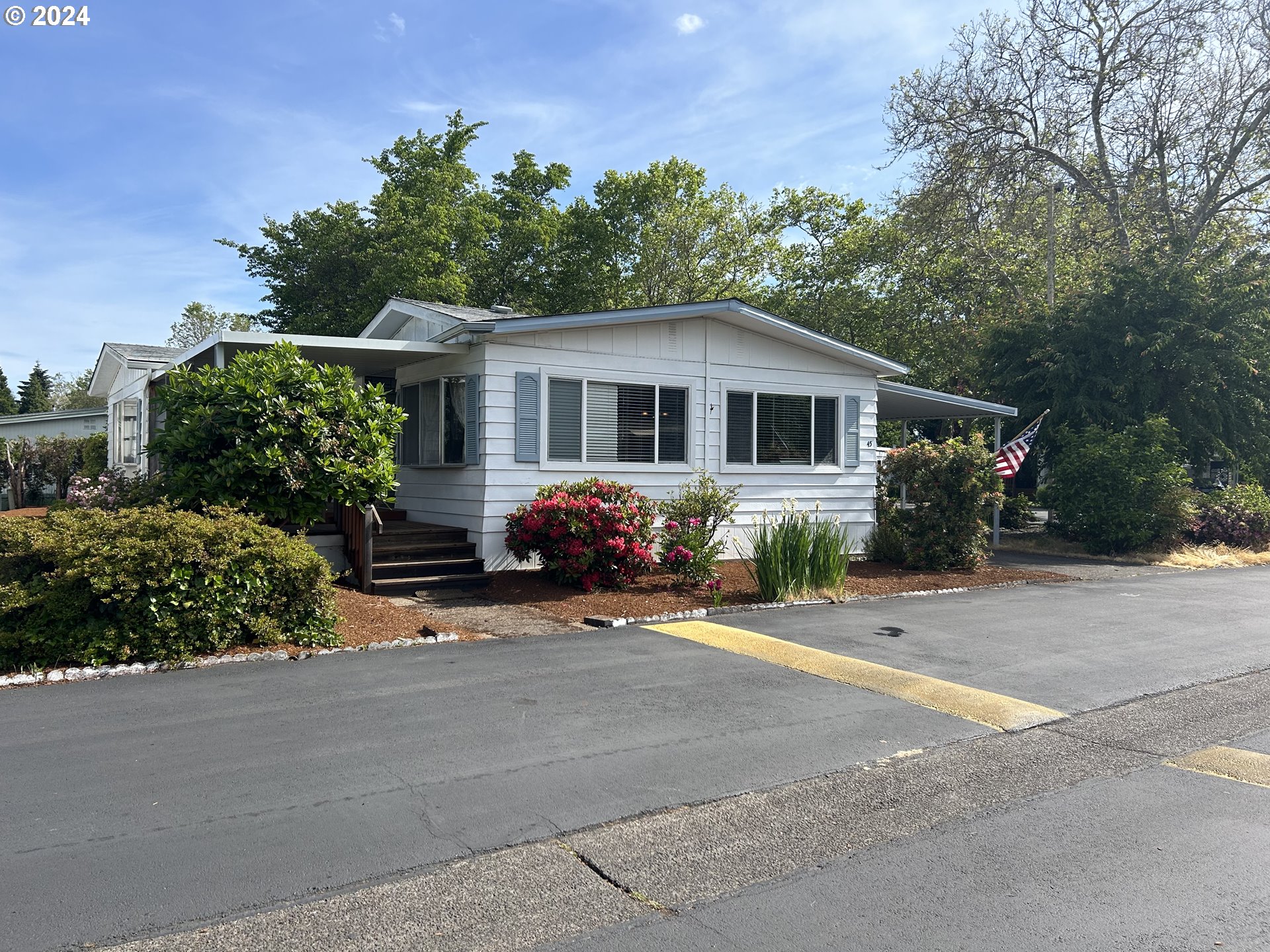 front view of a house with a patio