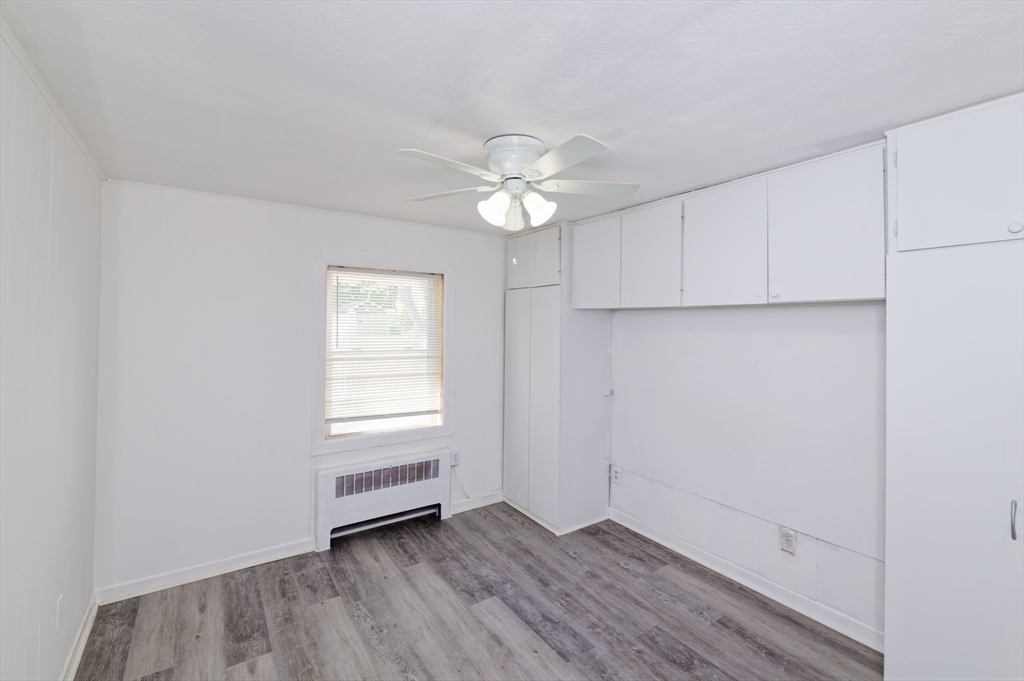 1 Rockland Rd Court Auburn, MA 01501 - Photo 17 of 38 wooden floor in an empty room with a window