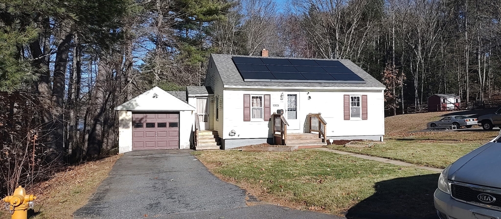 133 Douglas Road Gardner, MA 01440 - Photo 1 of 22 a view of a house with garden