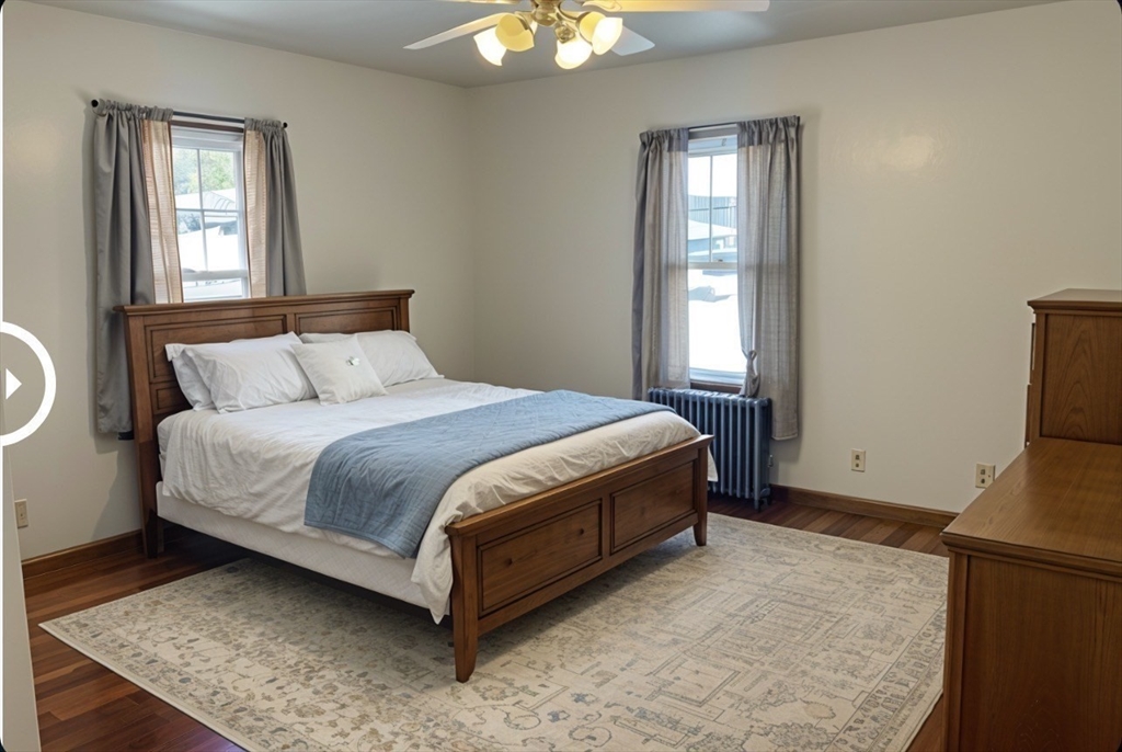 133 Douglas Road Gardner, MA 01440 - Photo 13 of 22 a bedroom with a bed and window