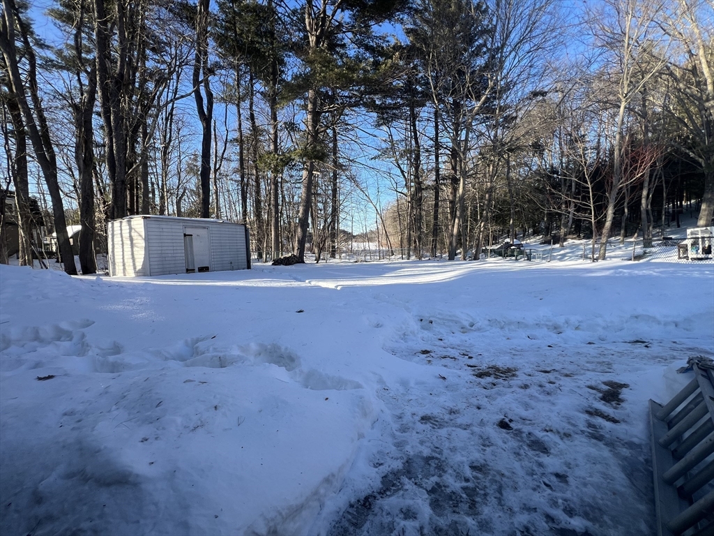133 Douglas Road Gardner, MA 01440 - Photo 20 of 22 a view of a yard with a house
