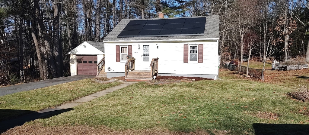 133 Douglas Road Gardner, MA 01440 - Photo 3 of 22 a house view with a backyard space