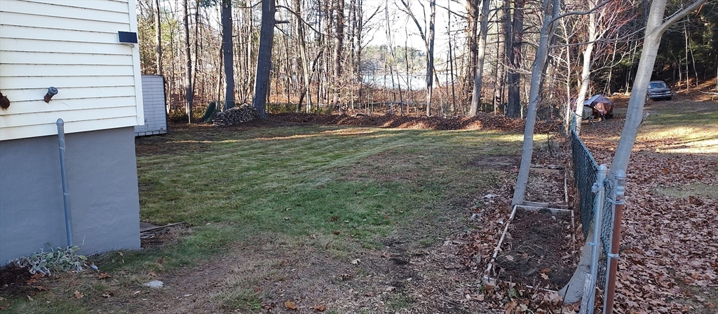 133 Douglas Road Gardner, MA 01440 - Photo 4 of 22 a view of a backyard with trees