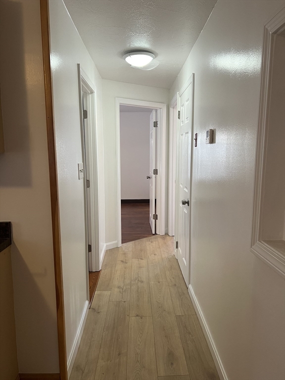 133 Douglas Road Gardner, MA 01440 - Photo 7 of 22 a view of a hallway