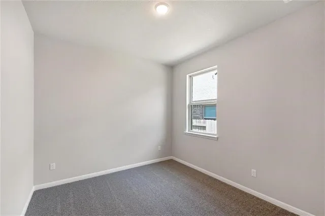 a view of a backyard with a garden