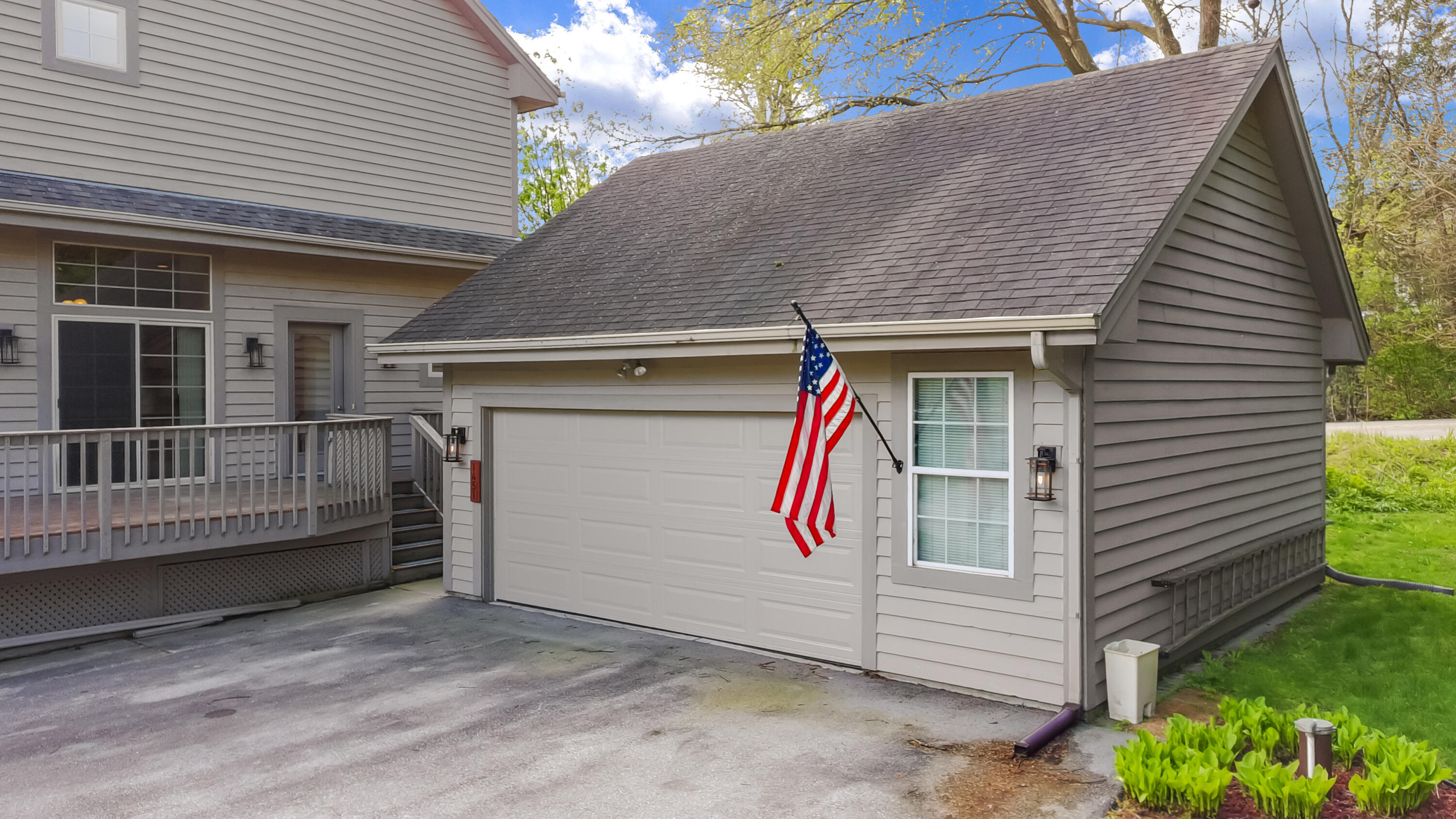 1451 Main Street Delafield, WI 53018 - Photo 2 of 46 2.5 car garage
