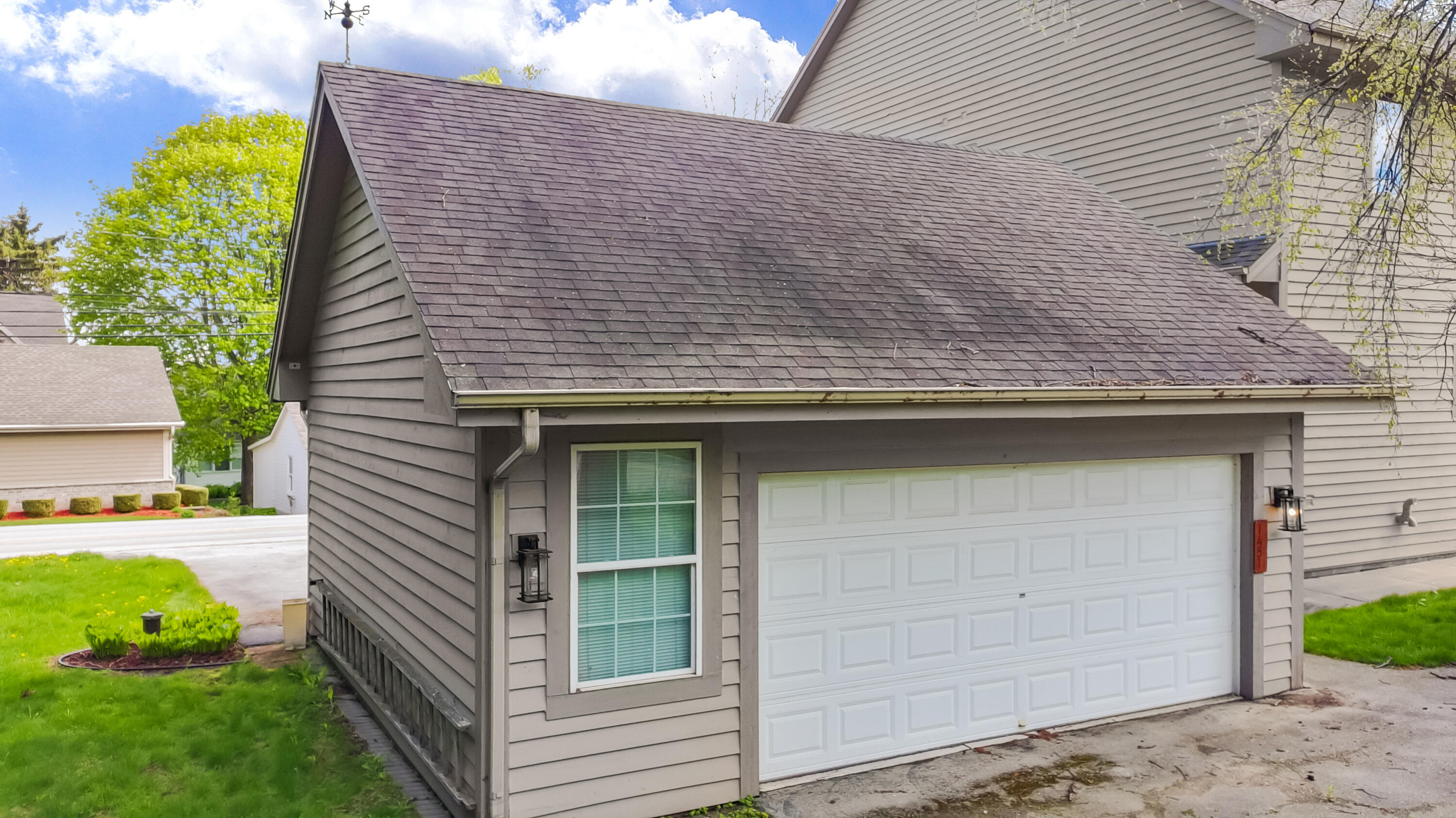 1451 Main Street Delafield, WI 53018 - Photo 33 of 46 Drive-thru Garage