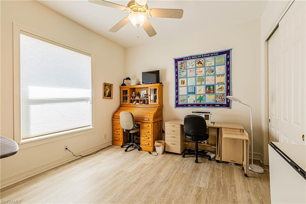 20196 Markward Crossing Estero, FL 33928 - Photo 12 of 28 a view of a workspace with furniture and a window