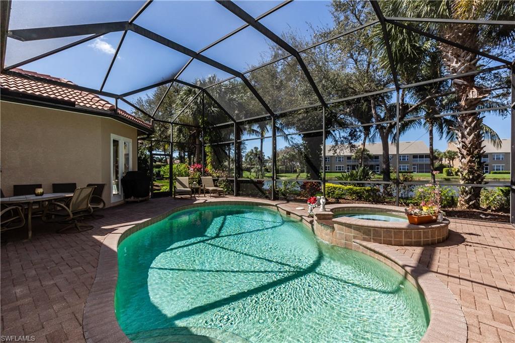 20196 Markward Crossing Estero, FL 33928 - Photo 18 of 28 a view of a swimming pool with a patio