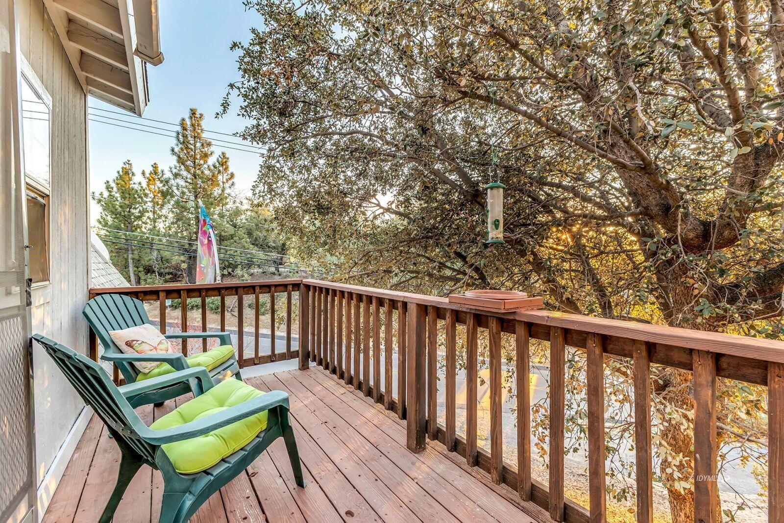 26750 Saunders Meadow Road, Unit 775 Idyllwild, CA 92549 - Photo 39 of 68 a view of a two chairs in the balcony