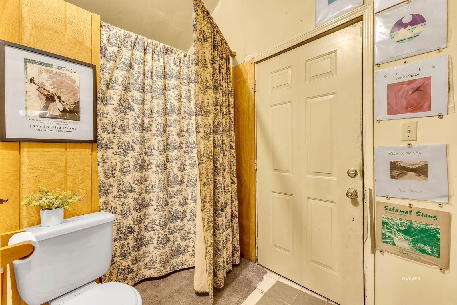 26750 Saunders Meadow Road, Unit 775 Idyllwild, CA 92549 - Photo 51 of 68 a bathroom with a shower and a toilet