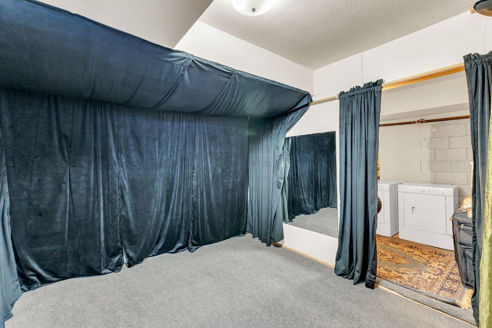 26750 Saunders Meadow Road, Unit 775 Idyllwild, CA 92549 - Photo 57 of 68 a bed room with a bed and a dresser