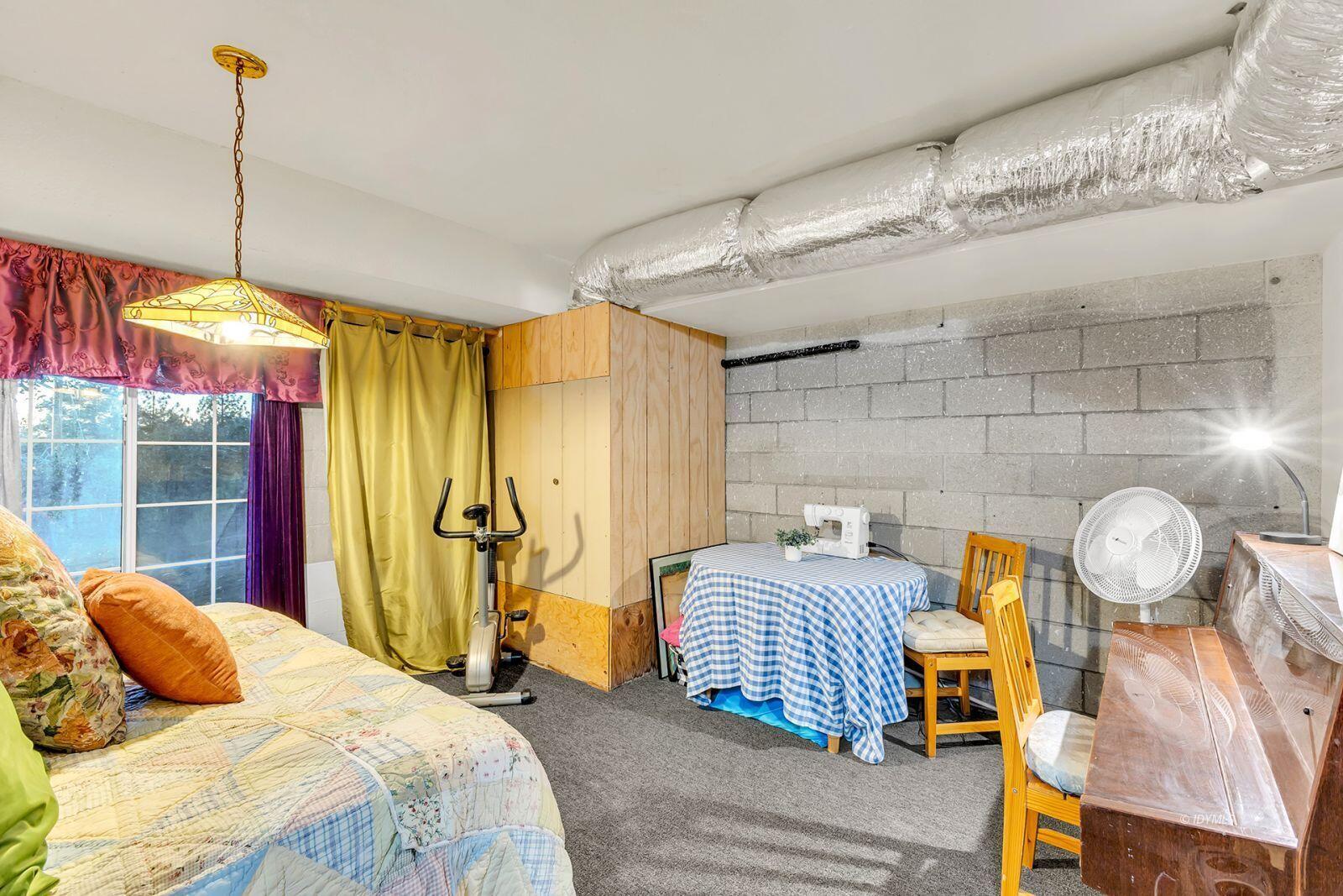 26750 Saunders Meadow Road, Unit 775 Idyllwild, CA 92549 - Photo 58 of 68 a bedroom with bed and window