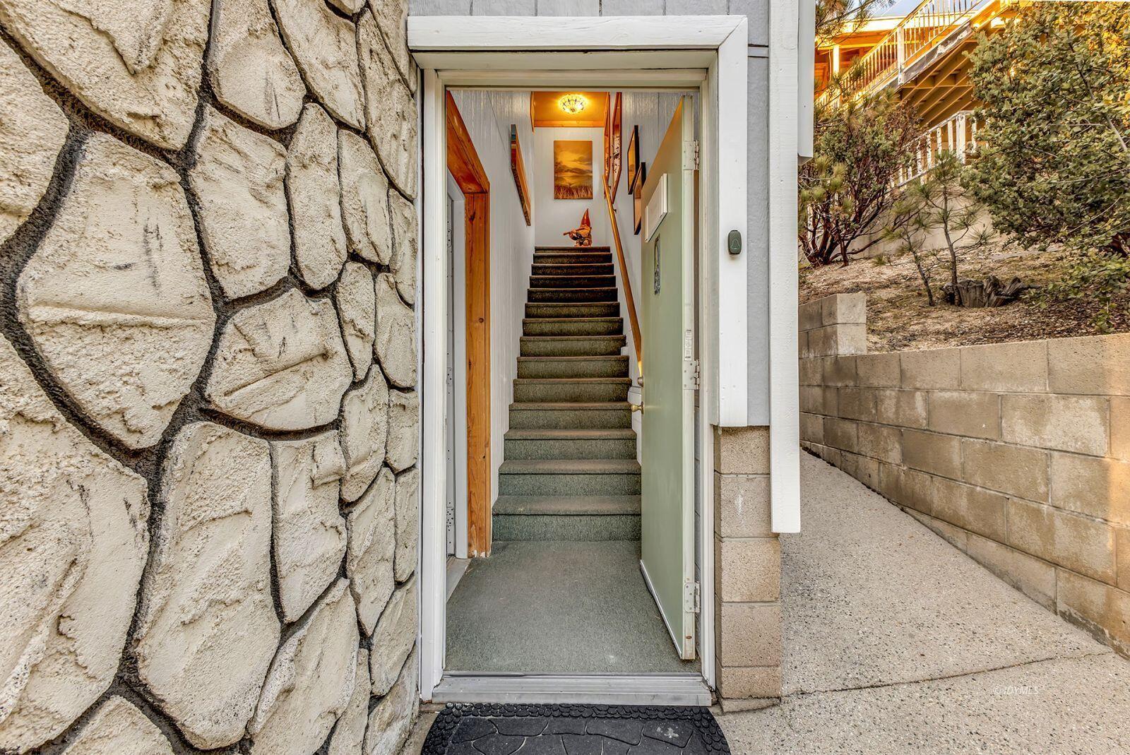 26750 Saunders Meadow Road, Unit 775 Idyllwild, CA 92549 - Photo 8 of 68 a view of a entryway door with wooden floor