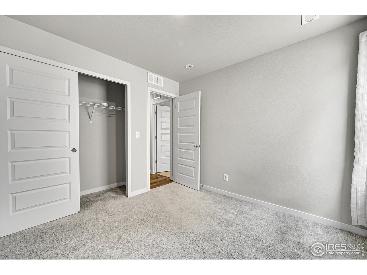 403 Pony Express Trail Ault, CO 80610 - Photo 19 of 31 a view of an empty room