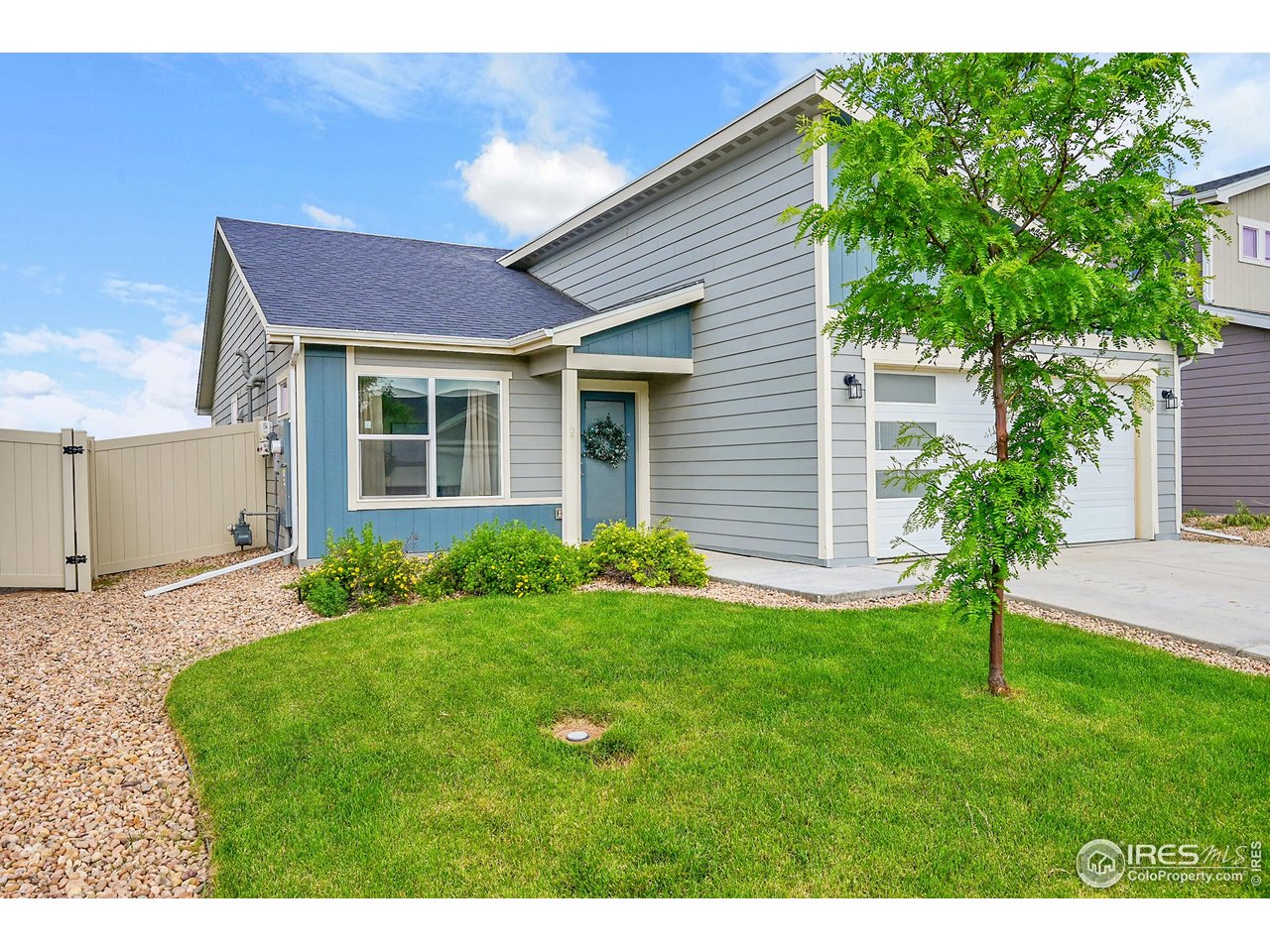 403 Pony Express Trail Ault, CO 80610 - Photo 2 of 31 a view front of house with a yard
