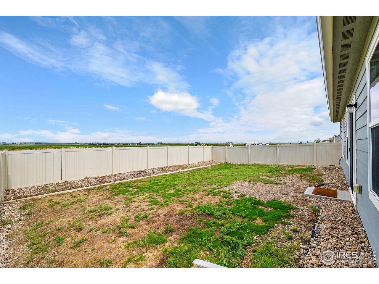 403 Pony Express Trail Ault, CO 80610 - Photo 27 of 31 a view of a dry yard with wooden fence