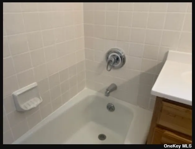 a bathroom with a tub