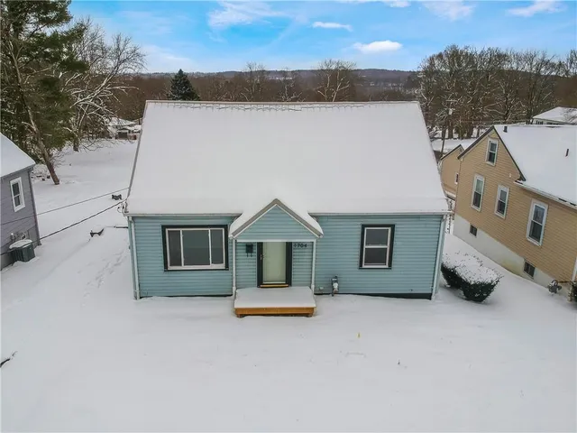 a house view with a garden space