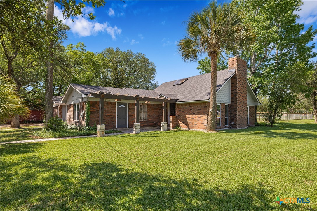 20 Hambleton Road Victoria, TX 77905 - Photo 1 of 48 a view of a house with a yard and large trees