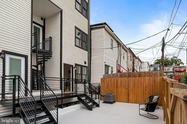 a view of a house with roof and windows
