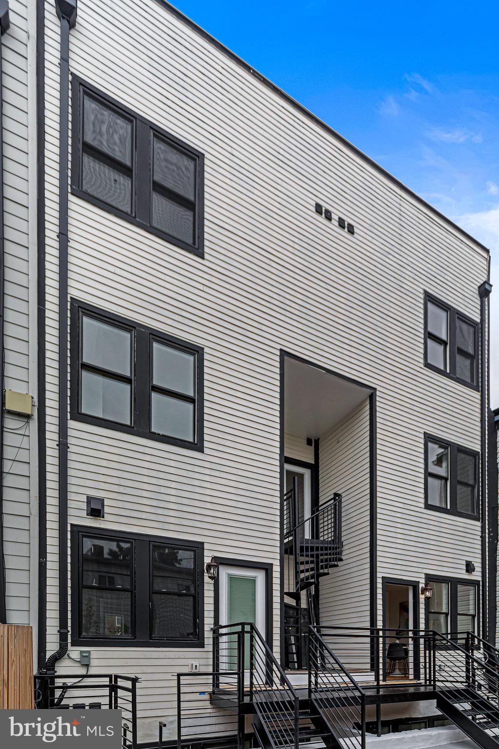 1107 Queen Street Northeast, Unit 2 Washington, DC 20002 - Photo 24 of 26 a view of a house with roof and windows