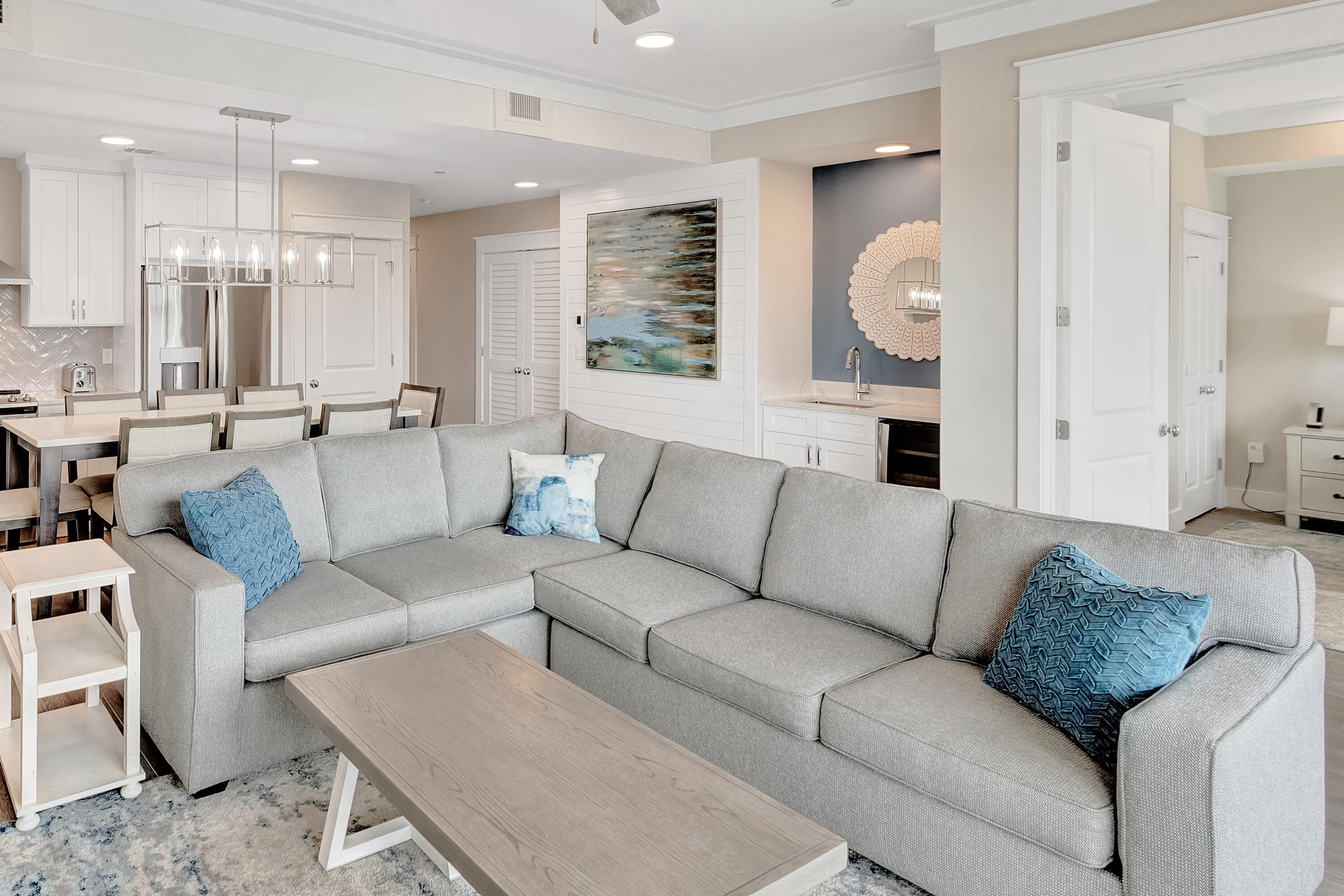 204 Henderson Resort Way, Unit 3104 Destin, FL 32541 - Photo 12 of 37 a living room with furniture and a large window