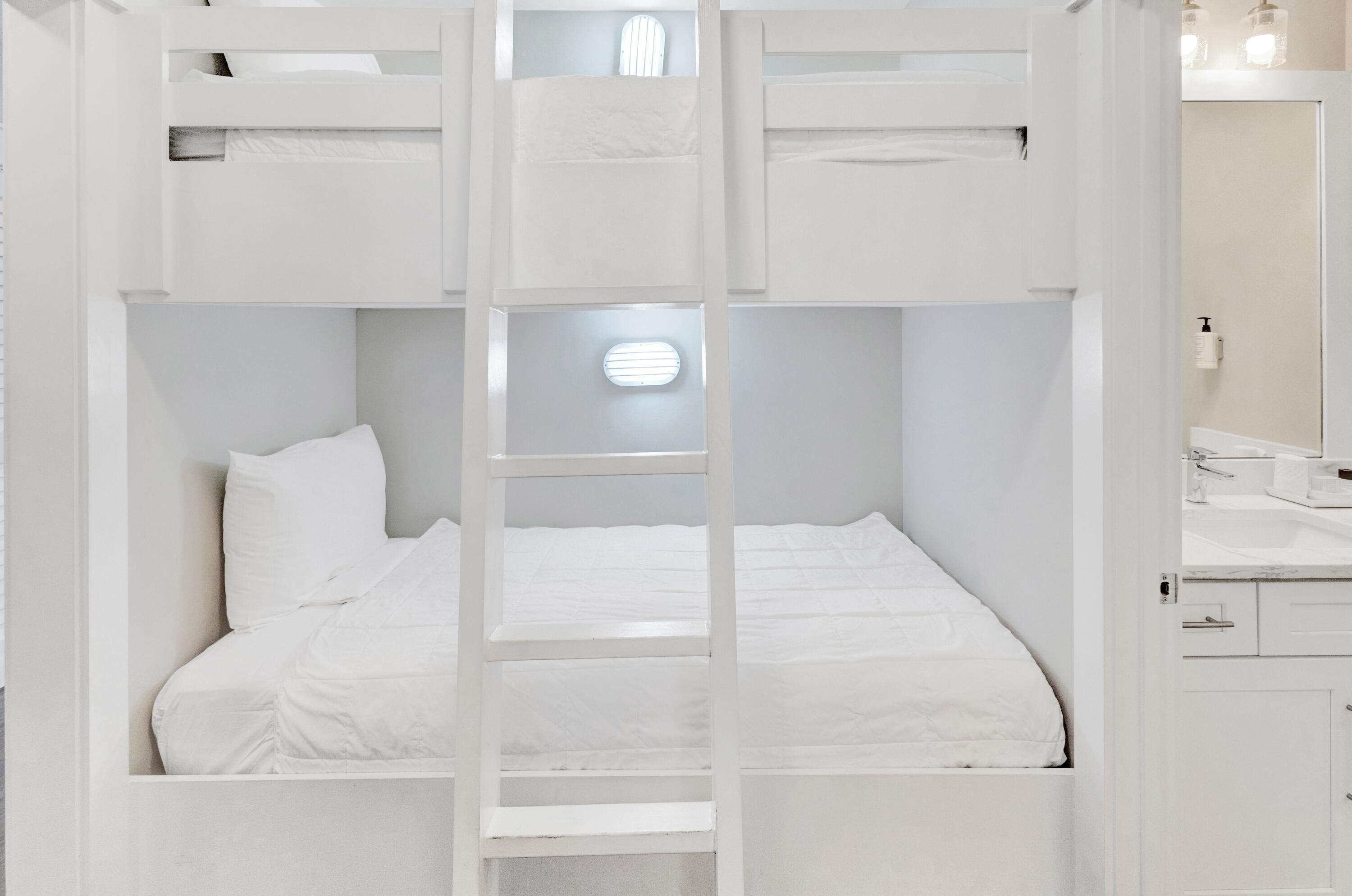 204 Henderson Resort Way, Unit 3104 Destin, FL 32541 - Photo 15 of 37 a white cabinet sitting in a kitchen