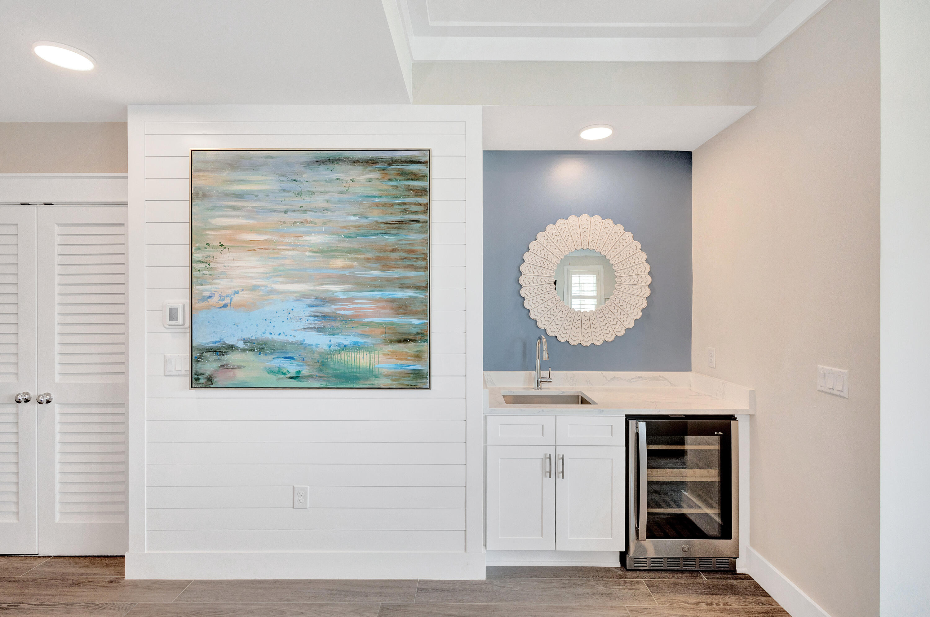 204 Henderson Resort Way, Unit 3104 Destin, FL 32541 - Photo 23 of 37 an empty room with wooden floor mirror and window