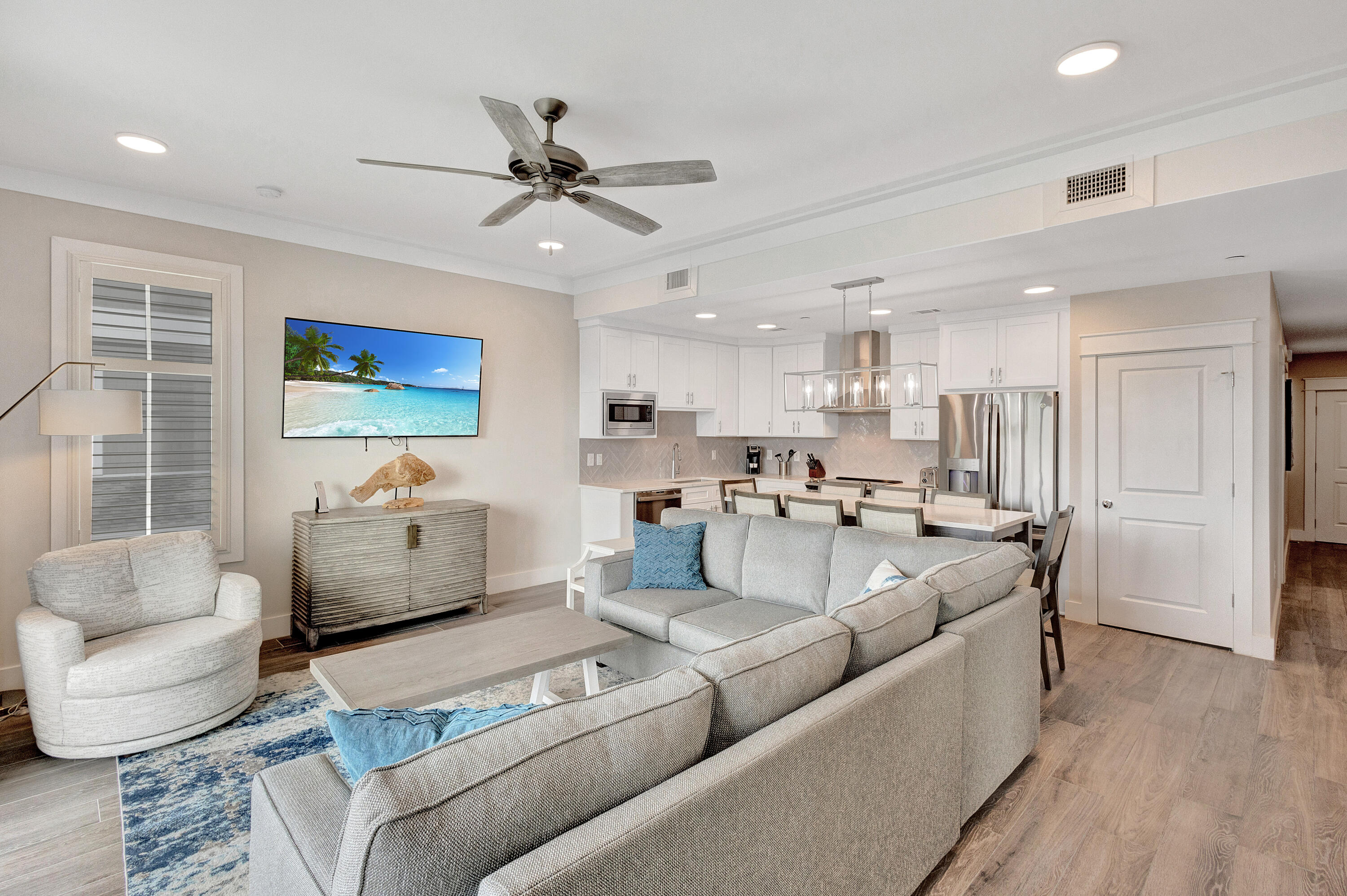 204 Henderson Resort Way, Unit 3104 Destin, FL 32541 - Photo 6 of 37 a living room with furniture and a large window