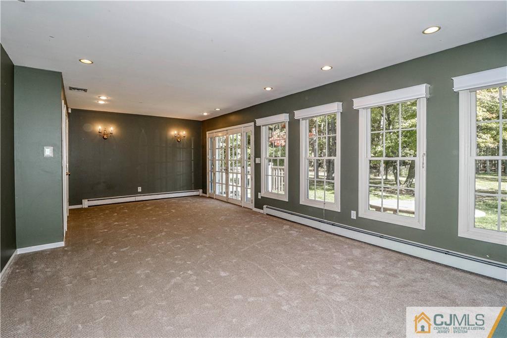 860 Grove Avenue Edison, NJ 08820 - Photo 7 of 22 a view of an empty room with a large window