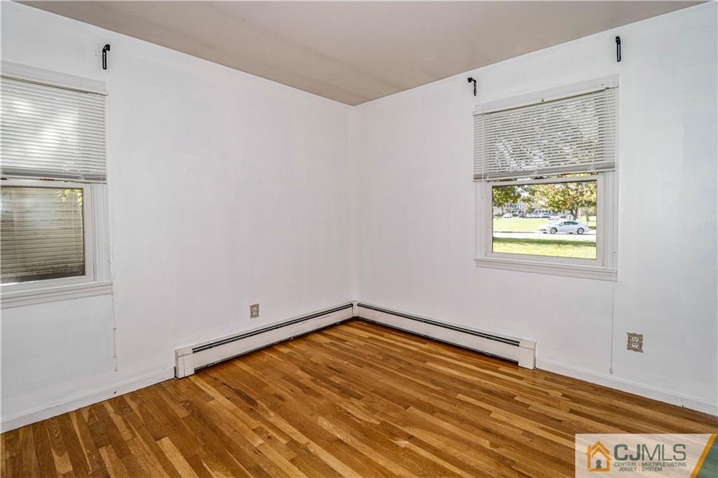 860 Grove Avenue Edison, NJ 08820 - Photo 10 of 22 a room with window