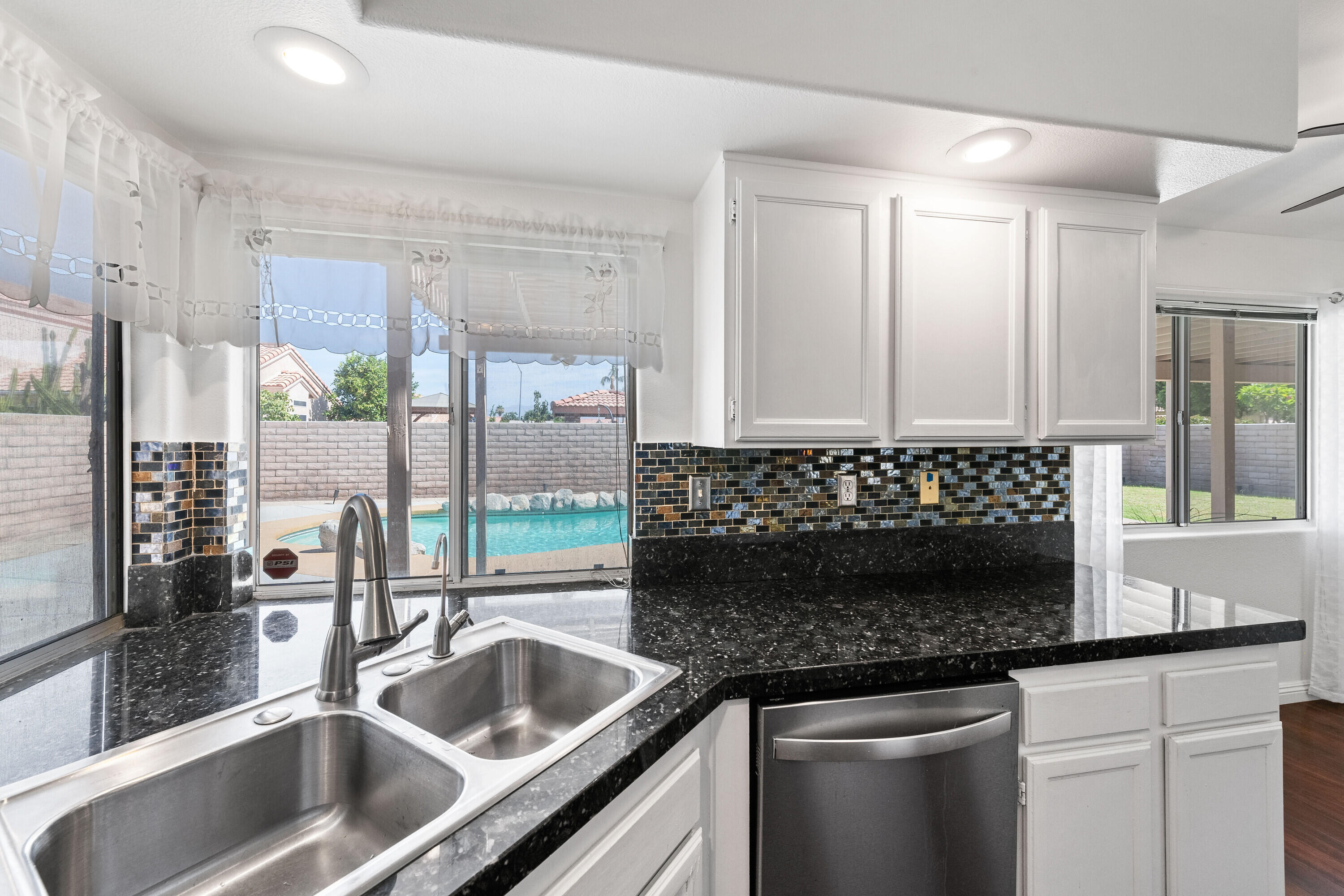 80366 Paseo Encanto Indio, CA 92201 - Photo 11 of 48 a kitchen with a sink and cabinets