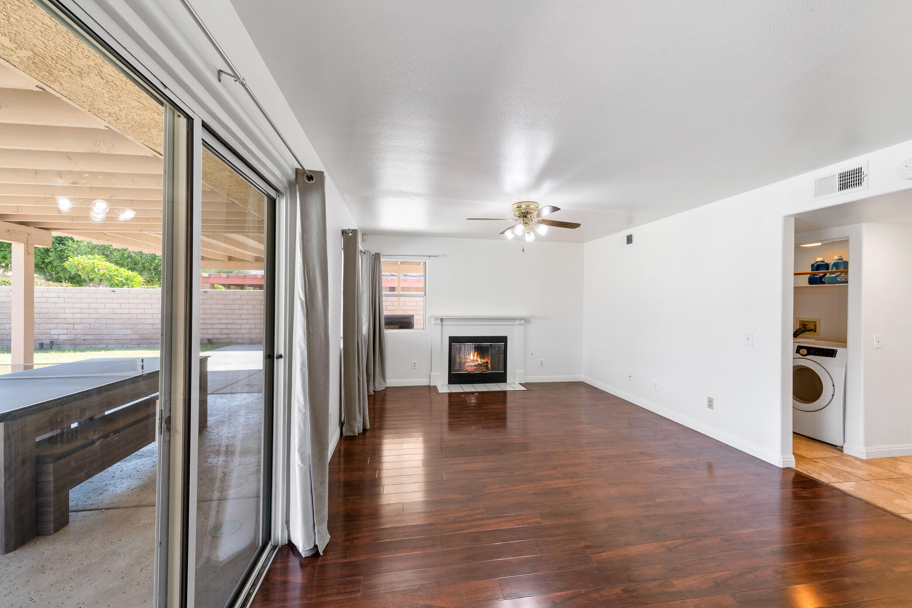 80366 Paseo Encanto Indio, CA 92201 - Photo 13 of 48 wooden floor in an empty room with a fireplace