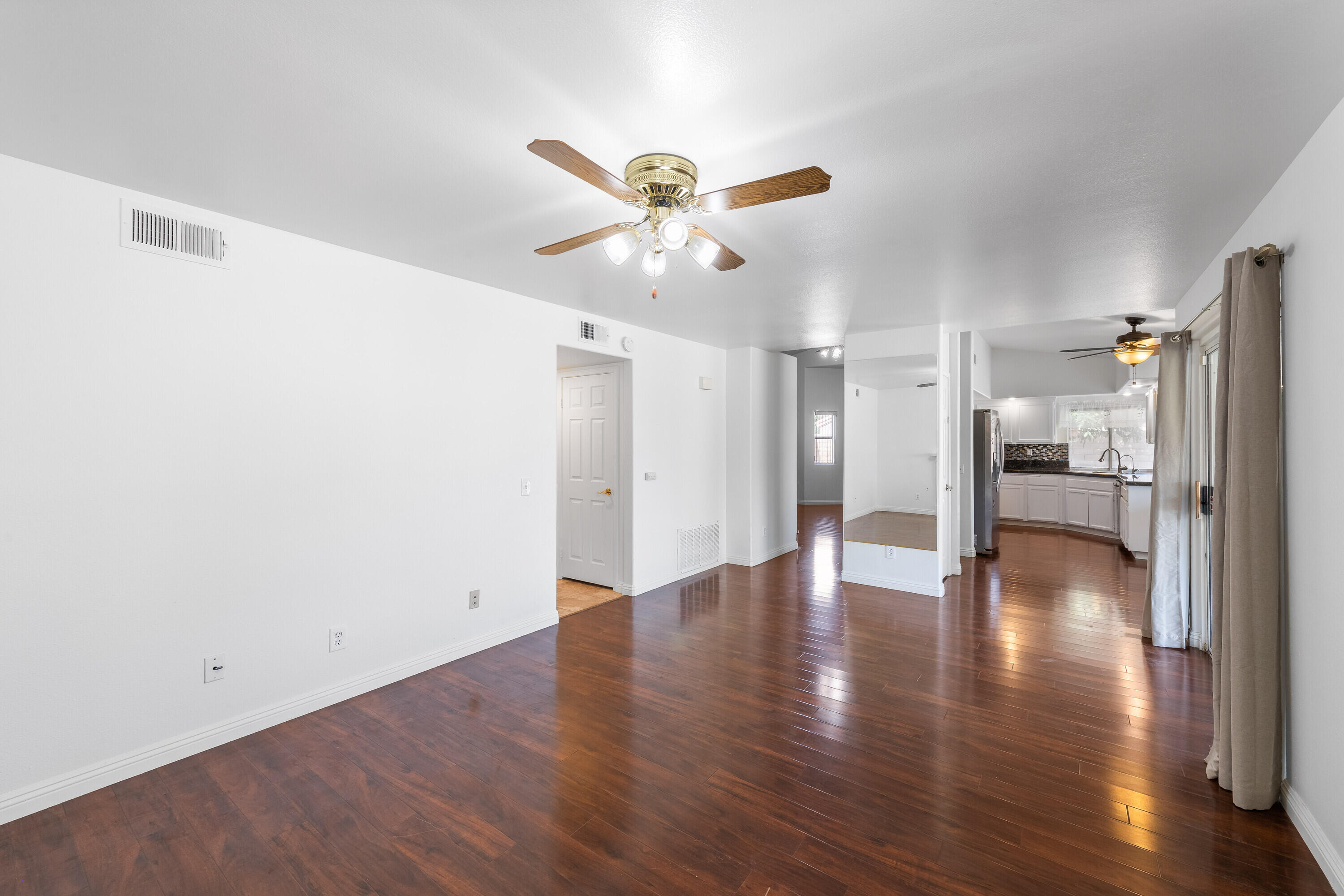 80366 Paseo Encanto Indio, CA 92201 - Photo 16 of 48 a view of an empty room with wooden floor