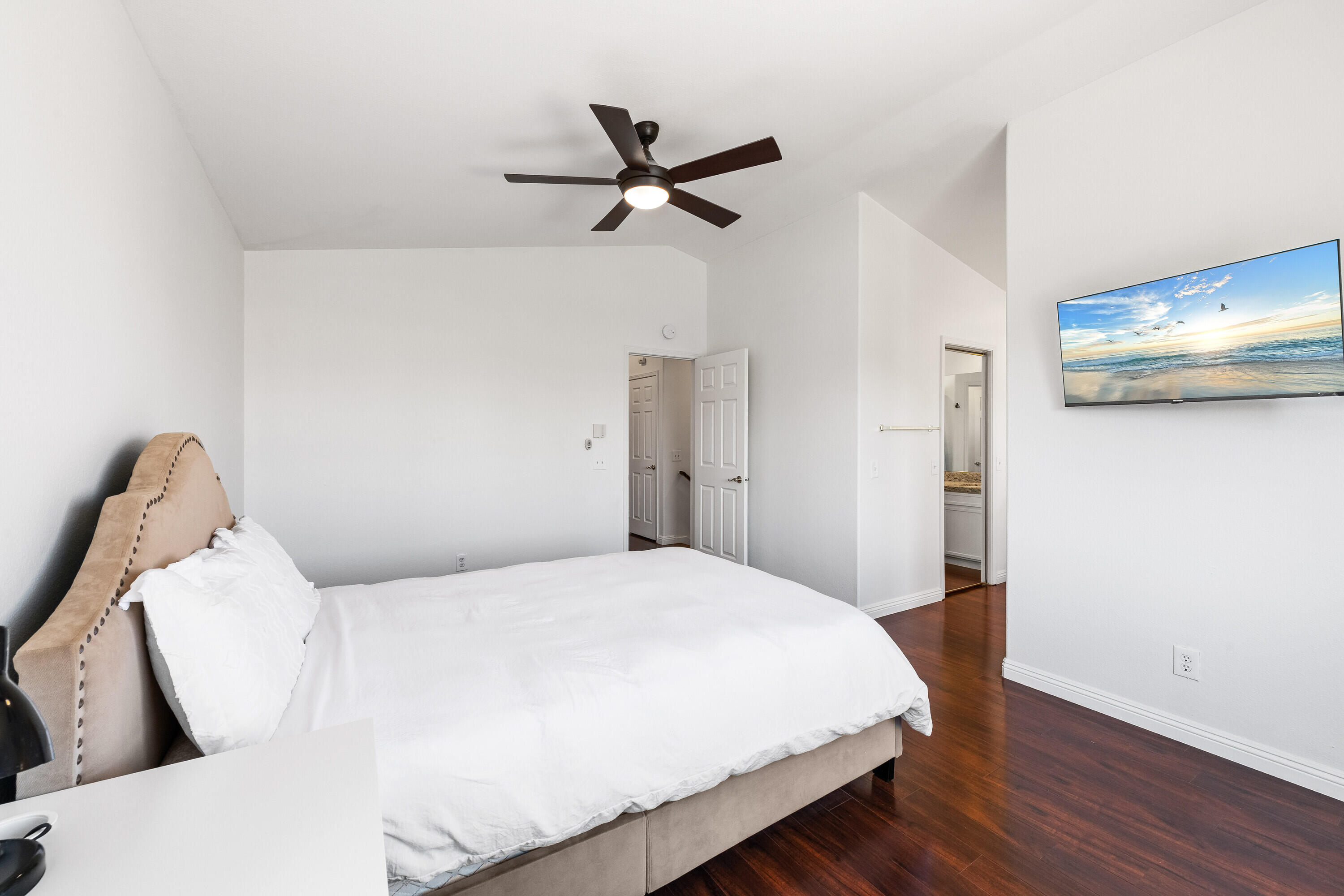 80366 Paseo Encanto Indio, CA 92201 - Photo 20 of 48 a bedroom with a bed and wooden floor