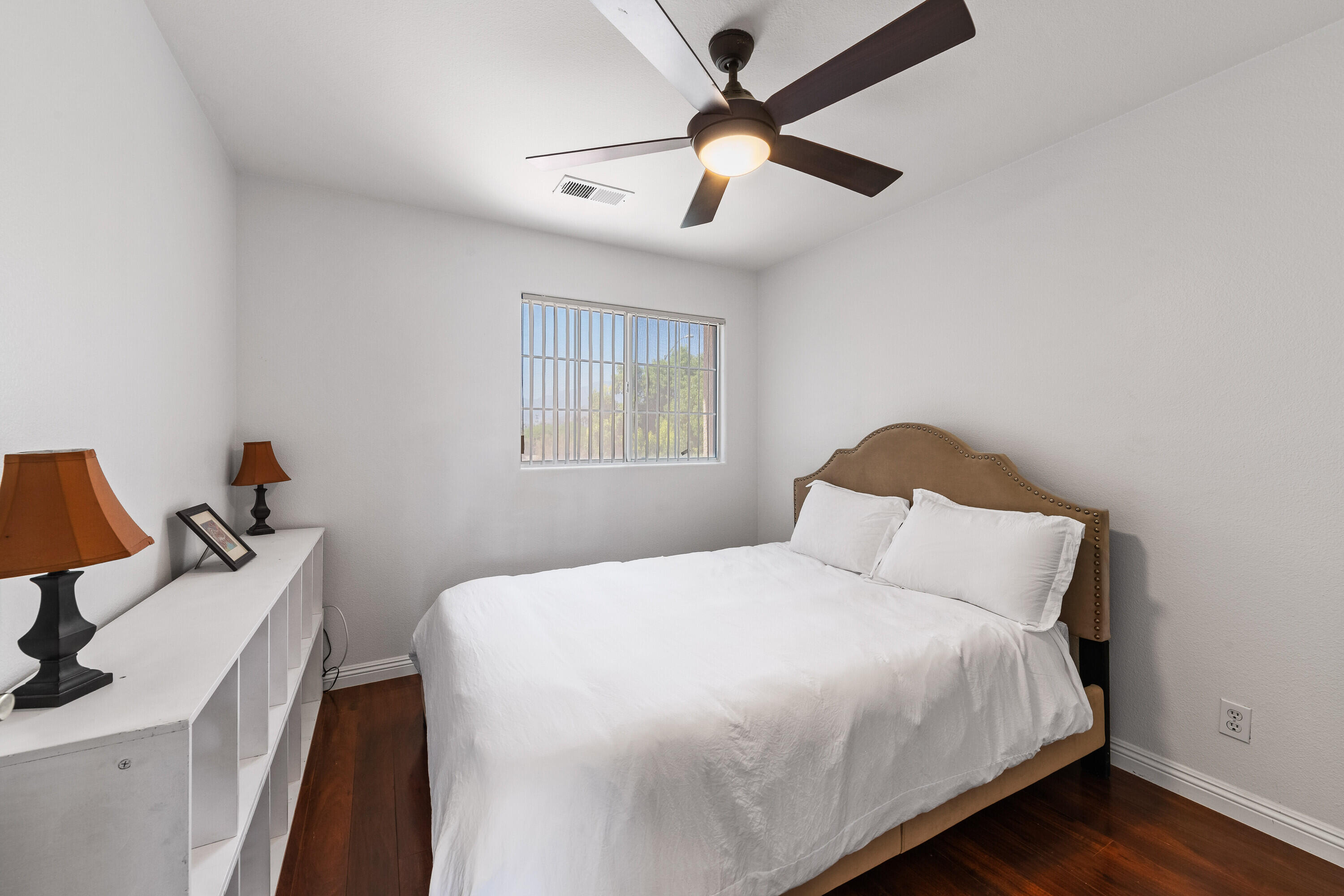 80366 Paseo Encanto Indio, CA 92201 - Photo 24 of 48 a bedroom with a bed and a chandelier