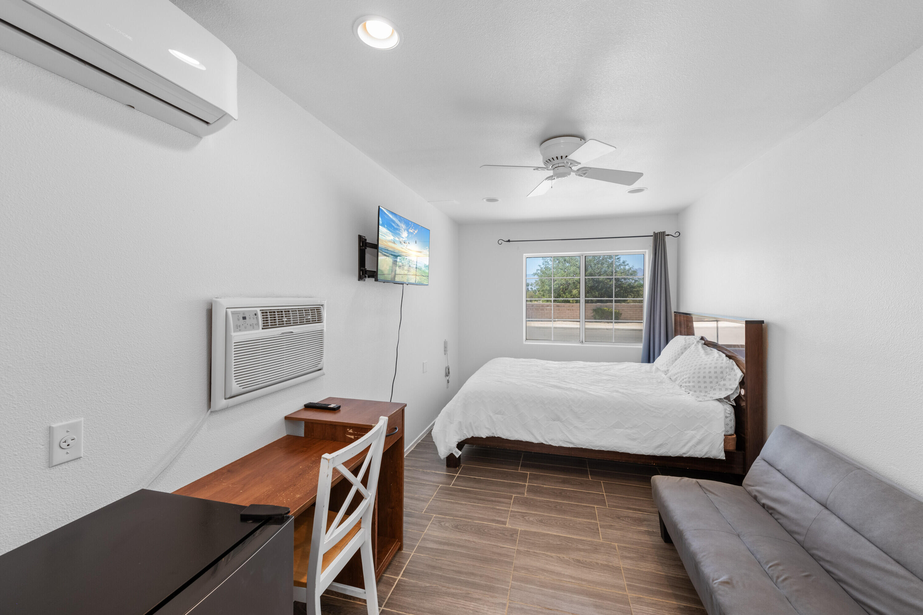 80366 Paseo Encanto Indio, CA 92201 - Photo 25 of 48 a bedroom with a bed and a window