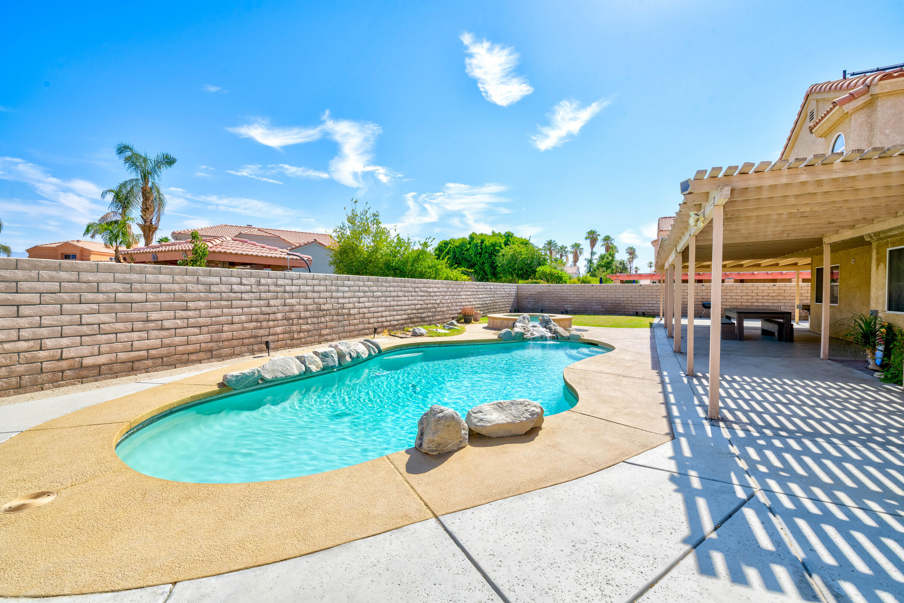 80366 Paseo Encanto Indio, CA 92201 - Photo 29 of 48 a view of a swimming pool with a patio