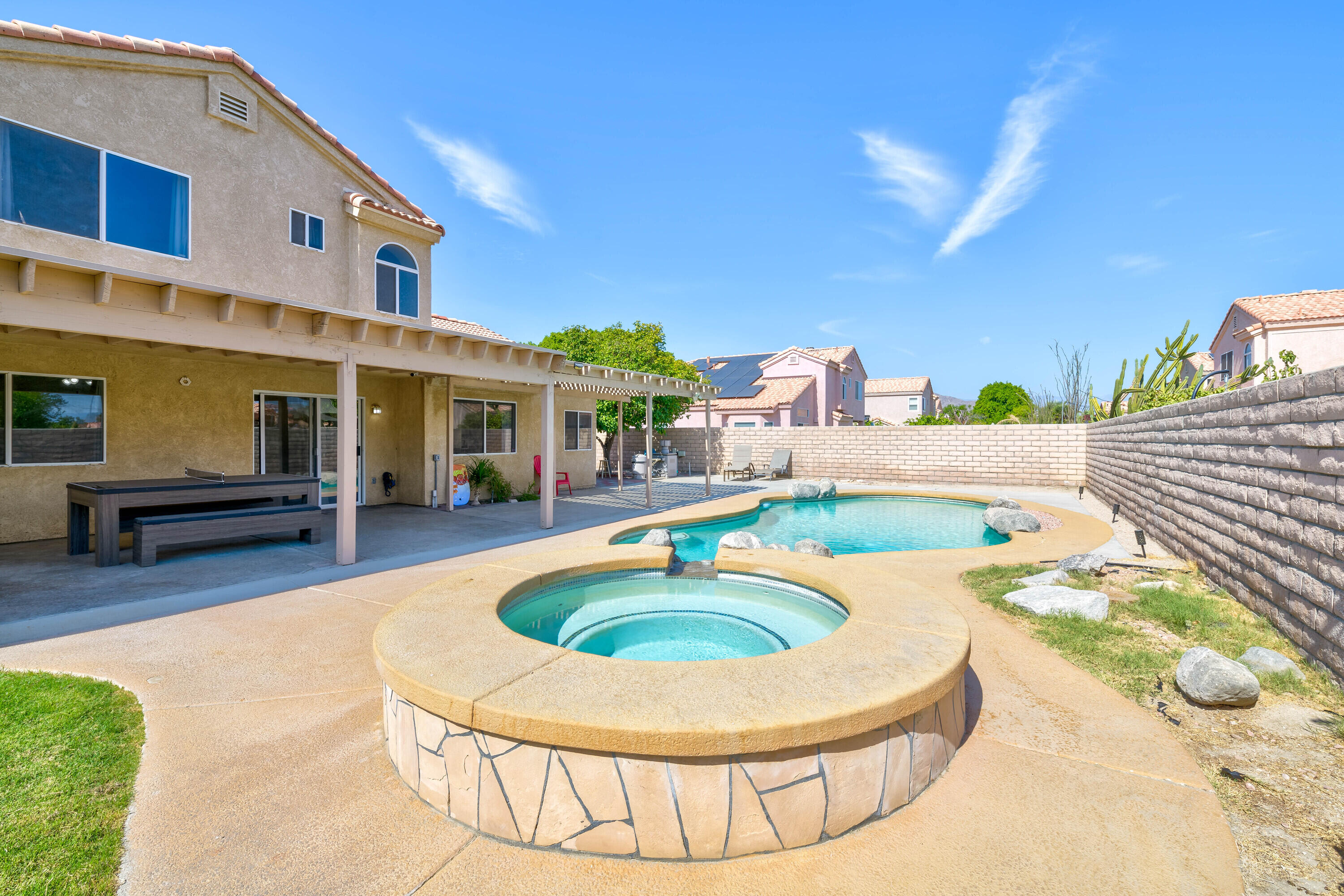 80366 Paseo Encanto Indio, CA 92201 - Photo 31 of 48 a view of a swimming pool with a patio