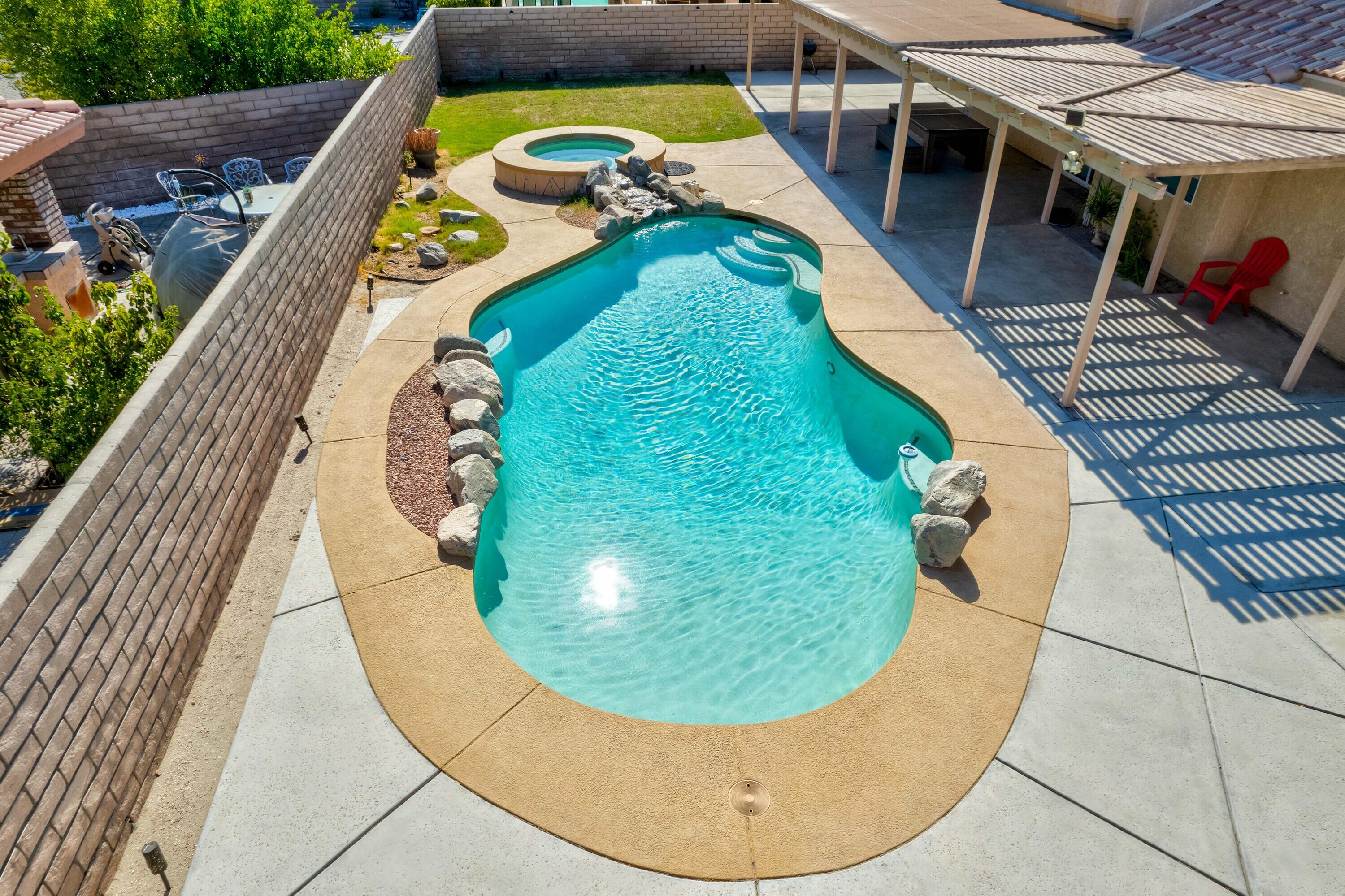 80366 Paseo Encanto Indio, CA 92201 - Photo 41 of 48 an aerial view of a house with swimming pool
