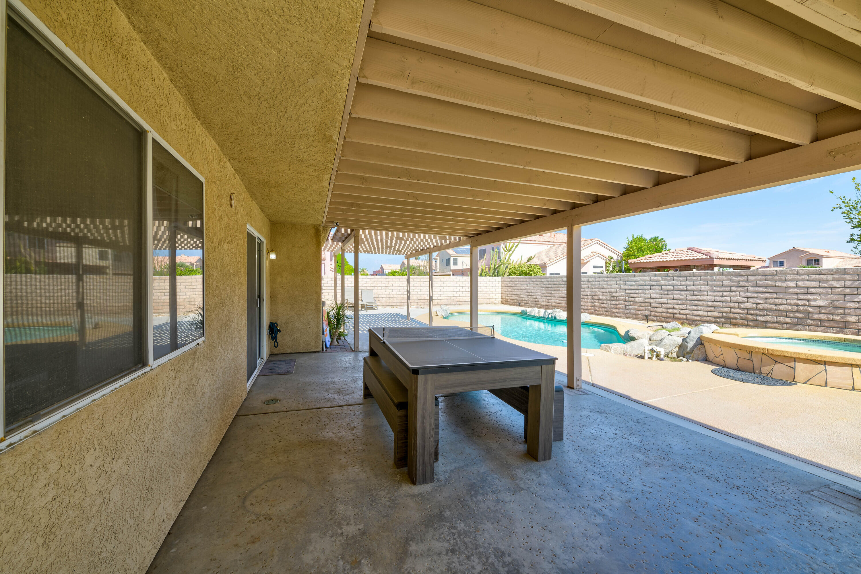 80366 Paseo Encanto Indio, CA 92201 - Photo 42 of 48 a building outdoor space with patio furniture