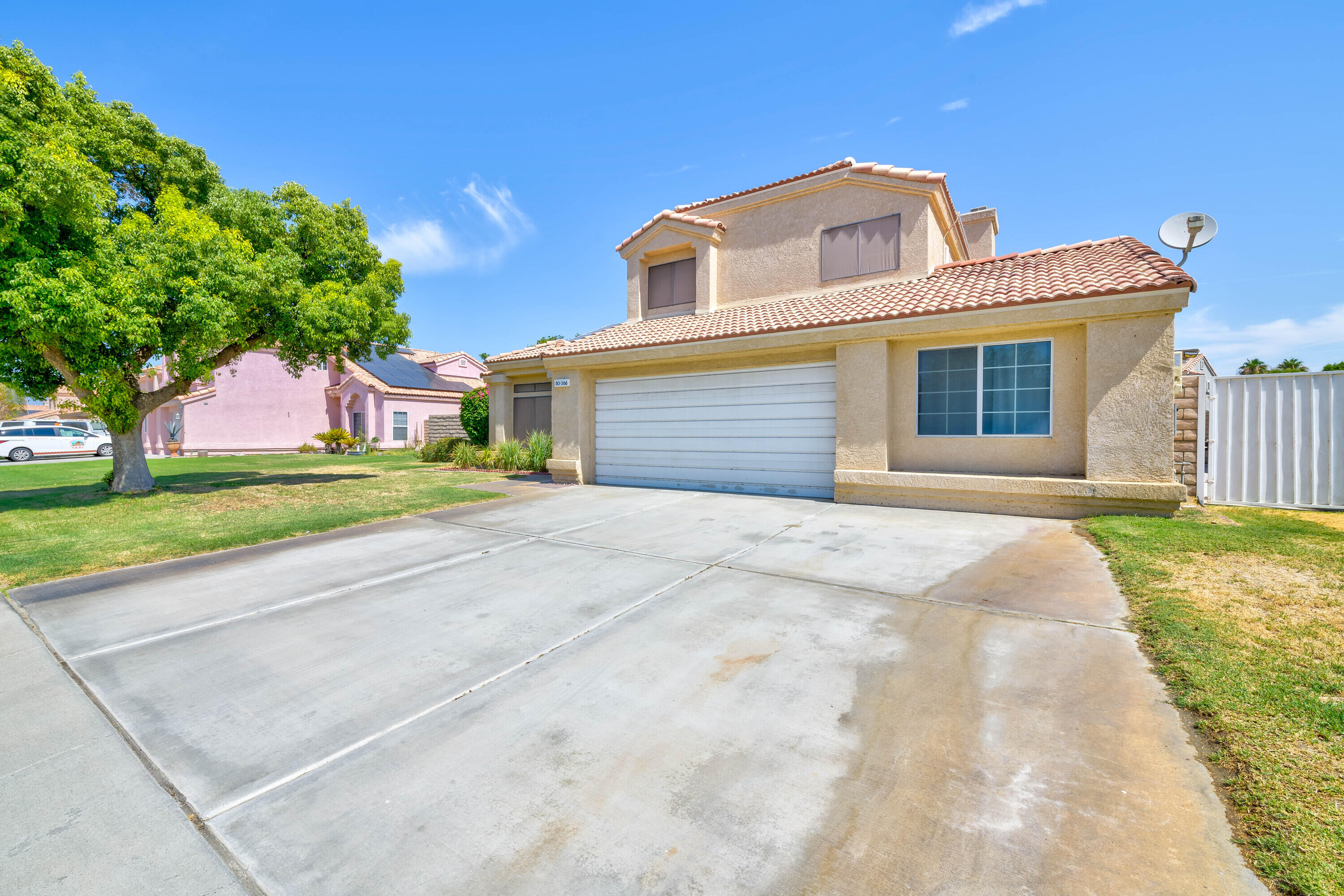 80366 Paseo Encanto Indio, CA 92201 - Photo 46 of 48 a front view of a house with a yard and garage
