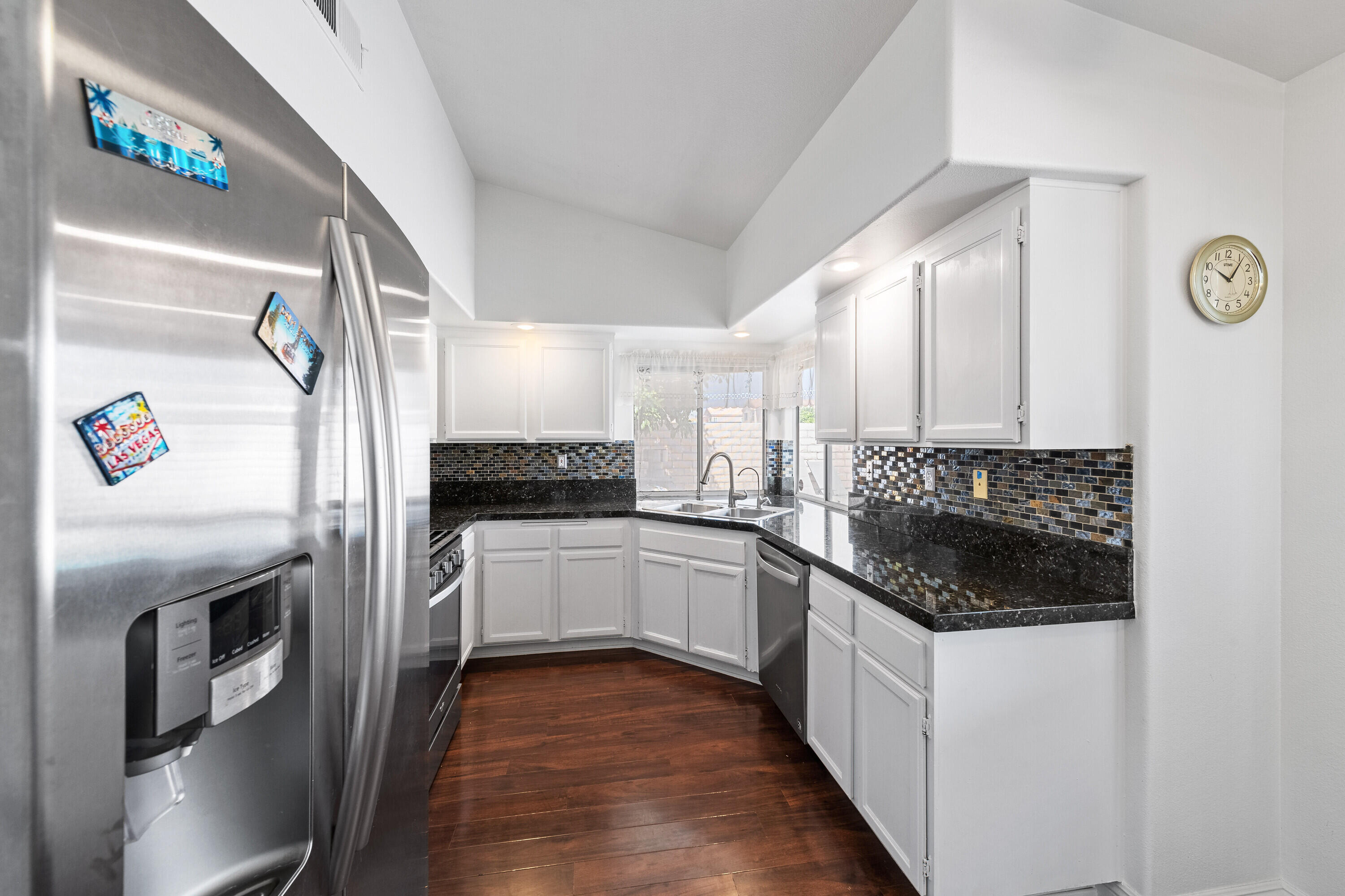 80366 Paseo Encanto Indio, CA 92201 - Photo 10 of 48 a kitchen with a sink and a refrigerator